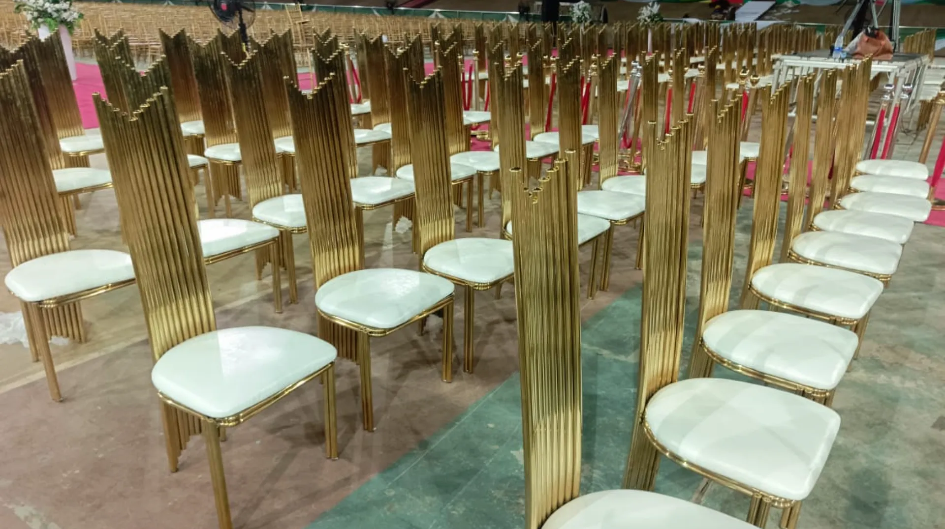 Chairs tables and canopies arranged for an event rental setup in Abuja