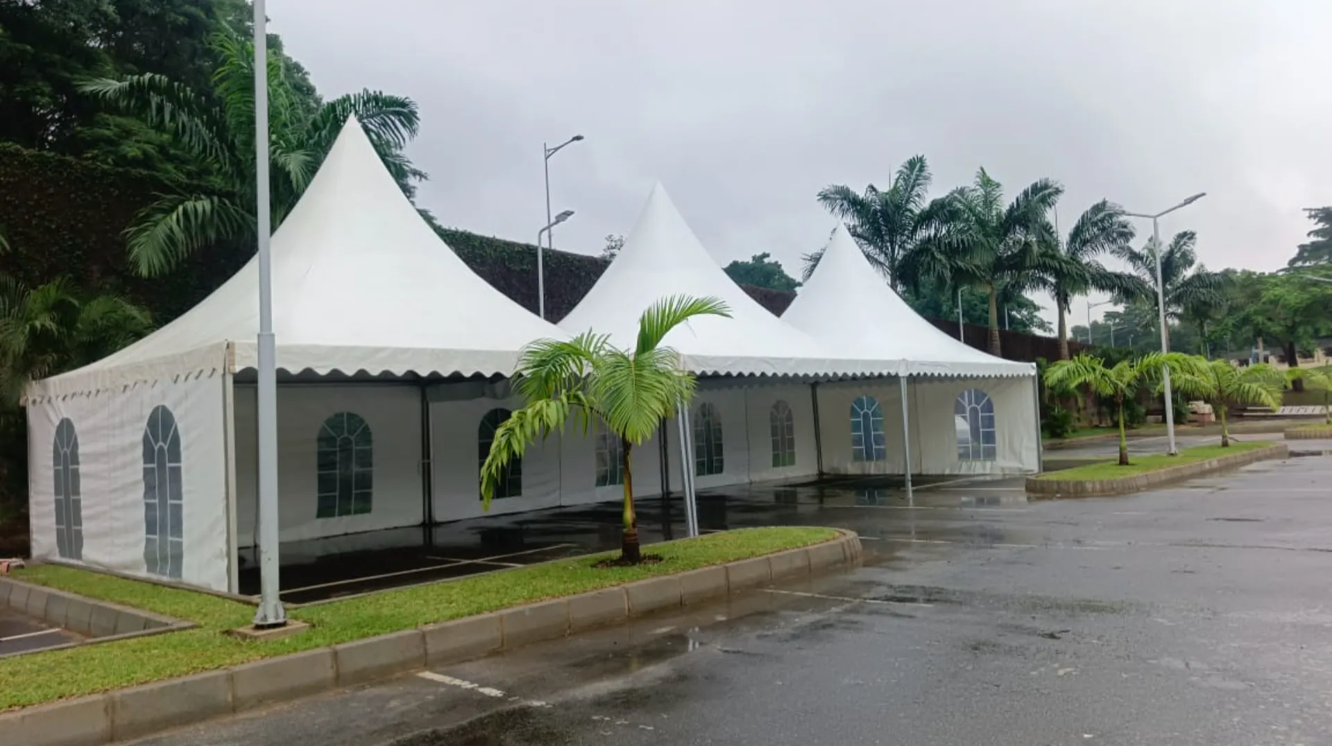 Chairs tables and canopies arranged for an event rental setup in Abuja