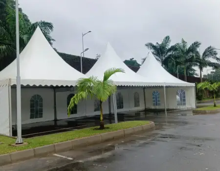 Chairs tables and canopies arranged for an event rental setup in Abuja