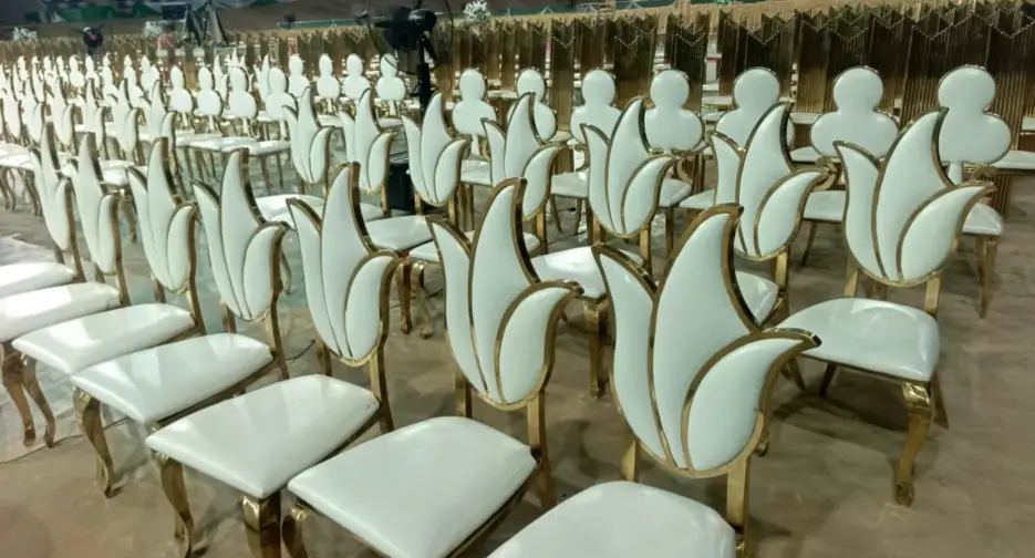 Chairs tables and canopies arranged for an event rental setup in Abuja